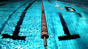 person swiming in a clean pool