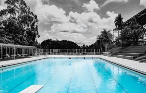picture of a black white sky and a blue pool